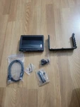 Feelworld FW759 7" On-camera Field Monitor 4K Hdmi Ips W/sun Shade. No Battery Open. Price: $74.99.