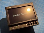 Marshall Electronics V-LCD70XP-3GSDI 7" Field Monitor + Gold Mount Adapter Used. Price: $150.00.