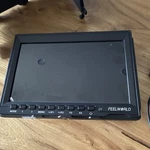 Feelworld FW759 7" Lcd Video Monitor Hdmi Av Sun Hood Power Adapter Used. Price: $49.00.